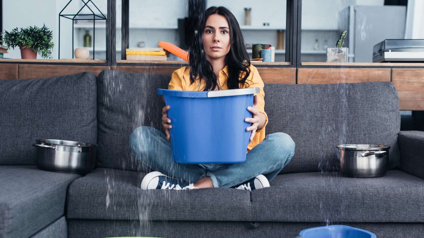 Water leaking into living room requiring emergency water removal